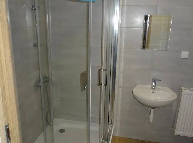 Pokoje Goscinne Holtur Podczele * 코워브제크